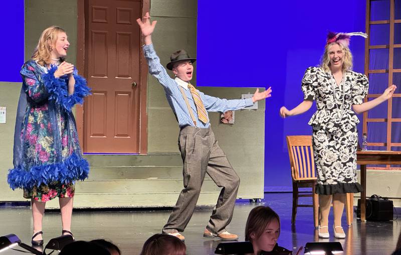 Miss Hannigan (played by Sadie Johnson), Rooster (Tobias Burkey) and Lily St. Regis (Molly Ewen) play out a scene from Ottawa High School's production of "Annie" earlier this week.