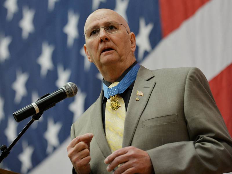 Medal of Honor recipient Sgt. Allen Lynch speaks during a patriotic assembly at Kaneland High School.