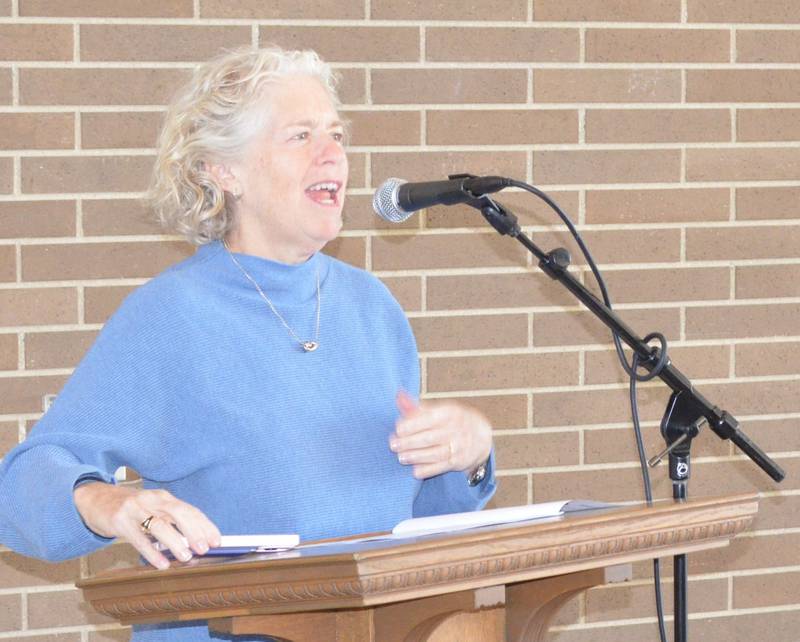 The Woodstock School District 200 Education Foundation co-chairperson Jaci Krandel speaks during an awards ceremony Thursday, Oct. 20, 2022, at Woodstock North High School.