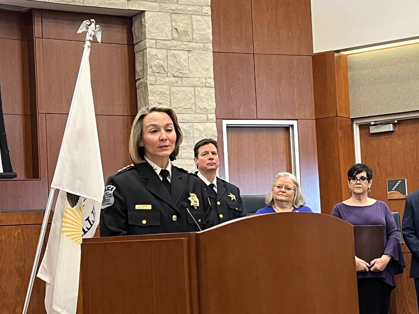 Tracy Chapman, police chief for the Forest Preserve of Will County, speaks about legislation modifying the Illinois Line of Duty Compensation Act at a press conference on Monday in Romeoville.