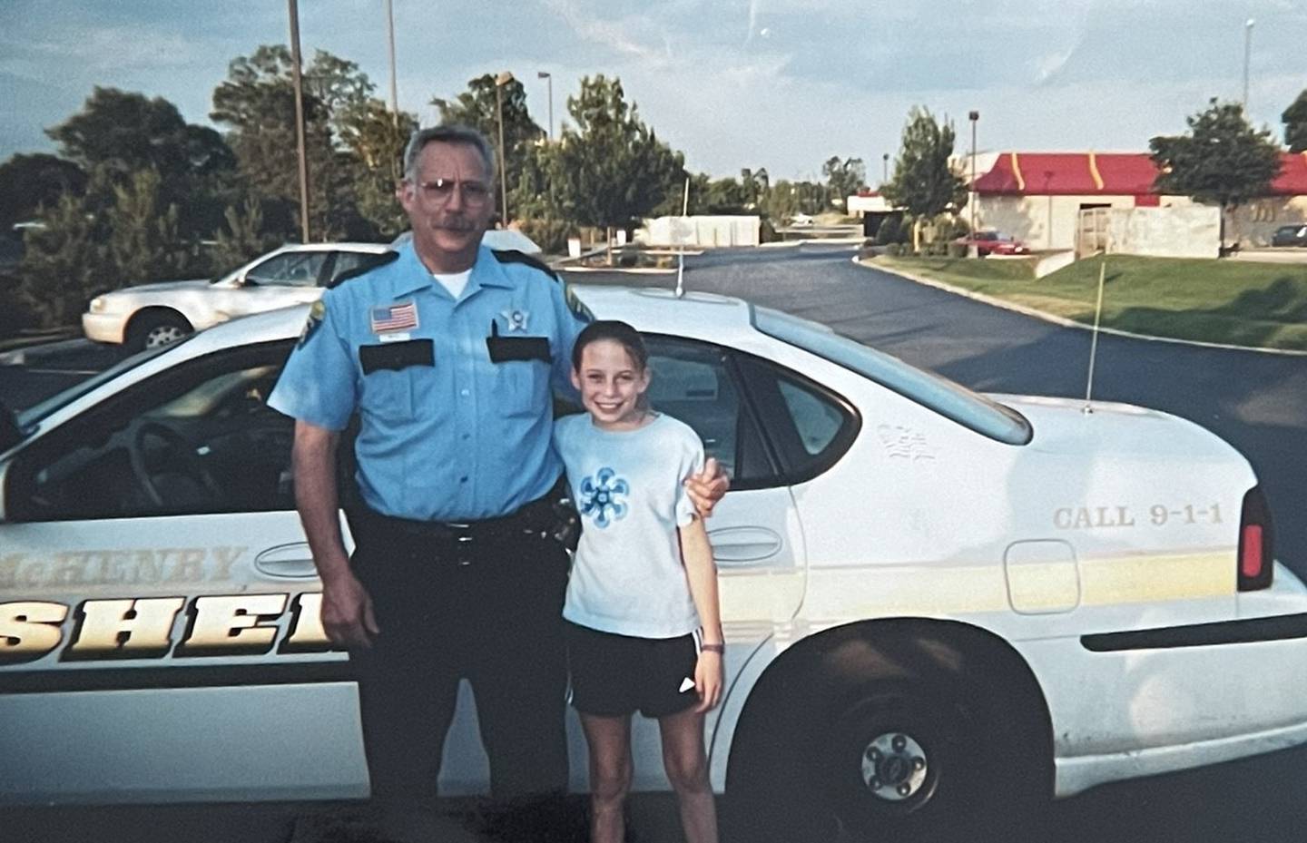 Meghan Kramer with her uncle, a former deputy with the McHenry County Sheriffs Department.