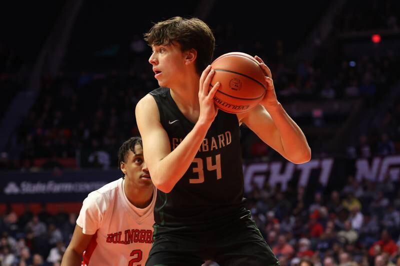 Glenbard West’s Braden Huff looks to pass against Bolingbrook in the Class 4A semifinal at State Farm Center in Champaign. Friday, Mar. 11, 2022, in Champaign.