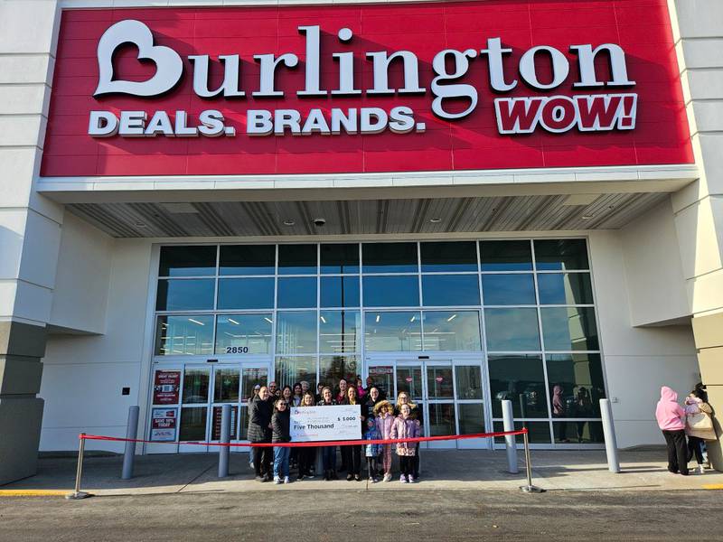M.J. Cunningham Elementary School Principal Marysol Sandoval, Assistant Principal Kelley Ratajczak, staff, students and parents from the Cunningham PTO attend the grand opening of Burlington's new Joliet store, located at Louis Joliet Pointe, 2850 Plainfield Road.