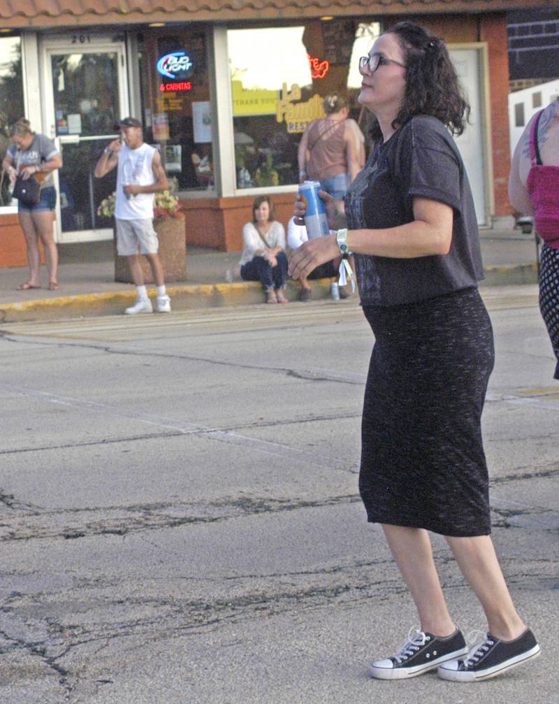 Katie King dances to the music of The Royal Hounds on Saturday, July 26, 2025, during George Fest in downtown Rock Falls.