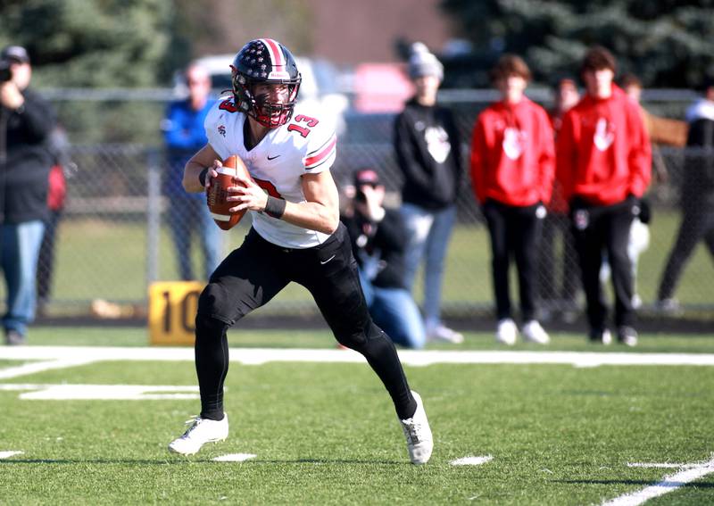 Lincoln-Way Central quarterback Michael Kuehl looks to pass the ball during the Class 7A second round playoff game against Batavia in Batavia on Saturday, Nov. 4, 2023.