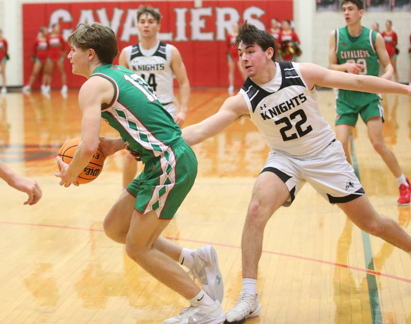 L-P's Braylin Bond sneaks by Kaneland's Brayden Seaton on Friday, Jan. 31, 2025 in Sellett Gymnasium at L-P High School.