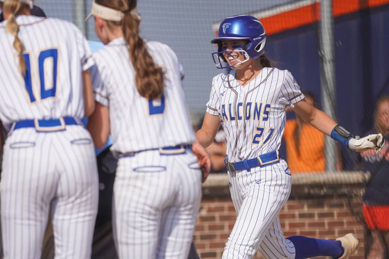 Wheaton North's Reagan Crosthwaite (21) smiles after hitting a two-run homer against Oswego during a Class 4A Oswego Sectional Final game at Oswego High School on Friday, June 6, 2025.
