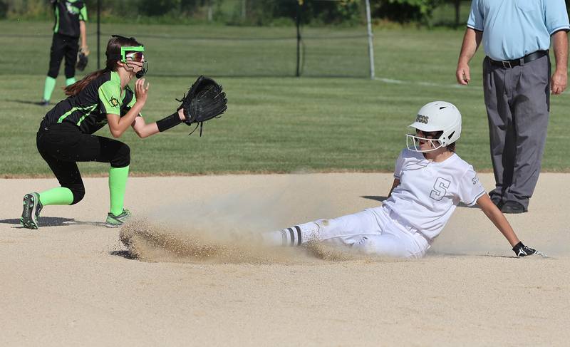 Sycamore Sycos' Sarah Foltz slides safely into second with a stolen base Friday, June 24, 2022, during their 12u game against the Forest City Toxic in the 22nd annual Storm Dayz tournament at the Sycamore Community Sports Complex.