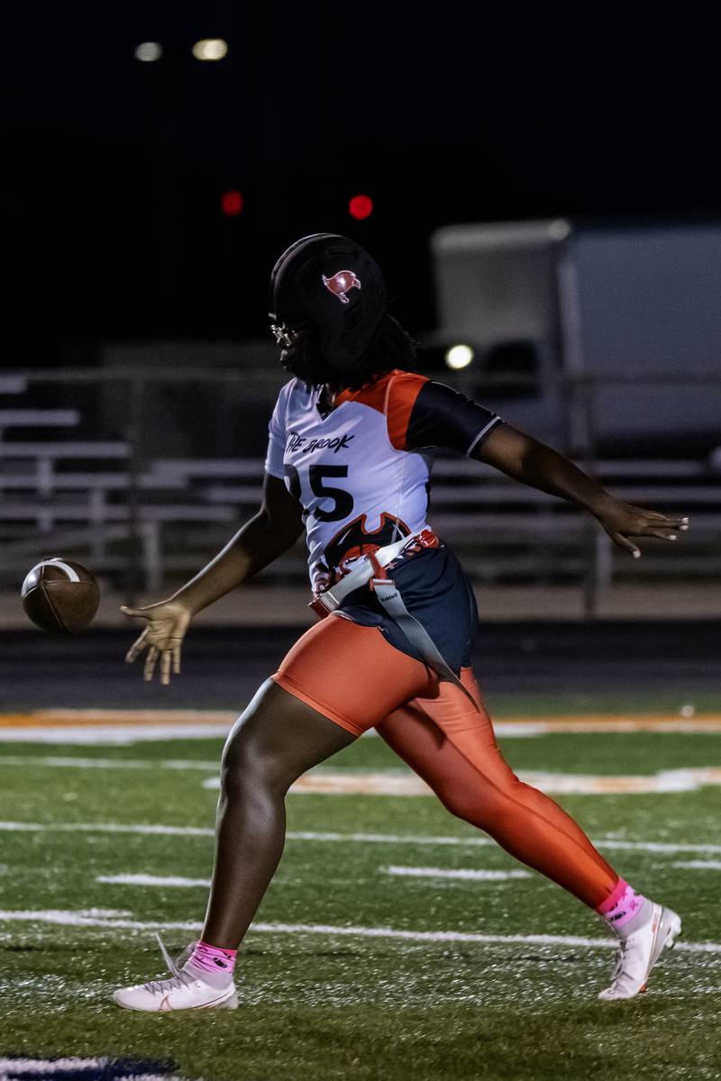 Bolingbrook's Maame Boakye prepares to punt during a varsity flag football Romeoville Regional semifinal game against Romeoville at Romeoville on Oct. 7, 2025.