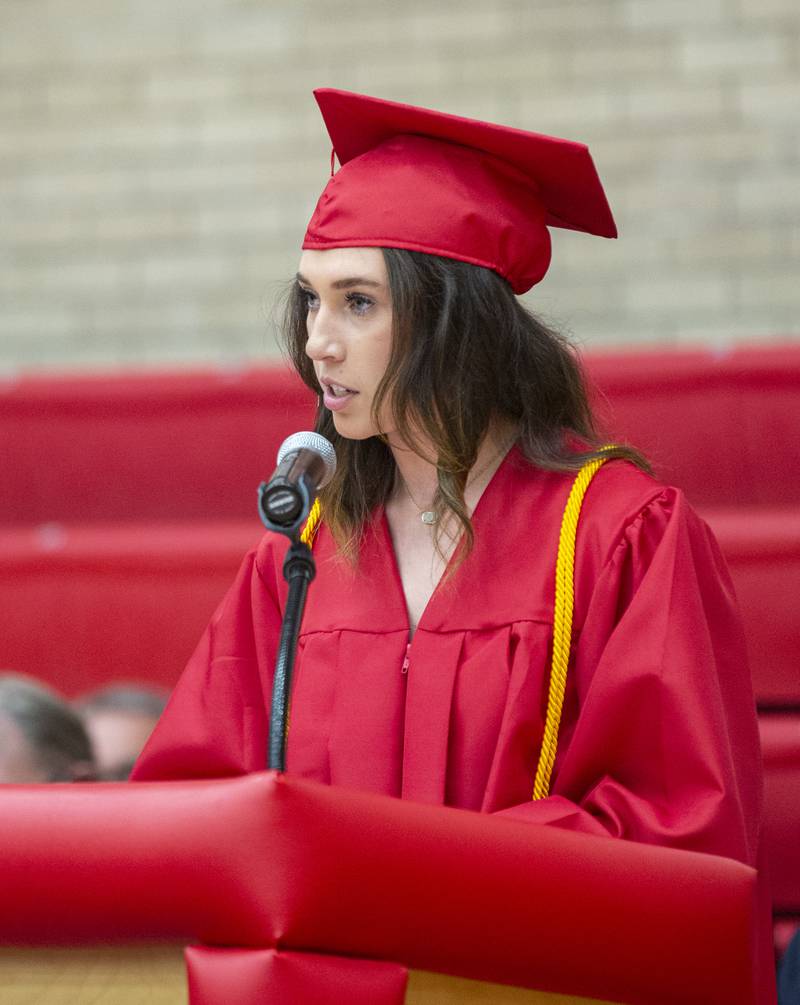 Senior Class President Molly Buscher addresses her classmates in a full gymnasium Friday, May 27, 2022, during graduation.
