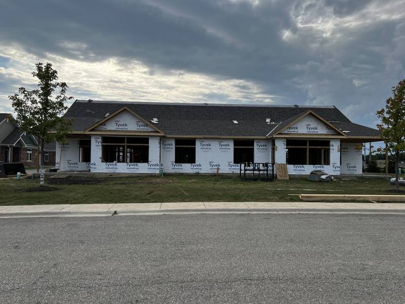 A partially completed building could be seen near the corner of Mount Hunger Road and N. Main St. in Sycamore, on Aug. 16, 2024, inside the first phase of Old Mill Park, a 55-and-older living community.