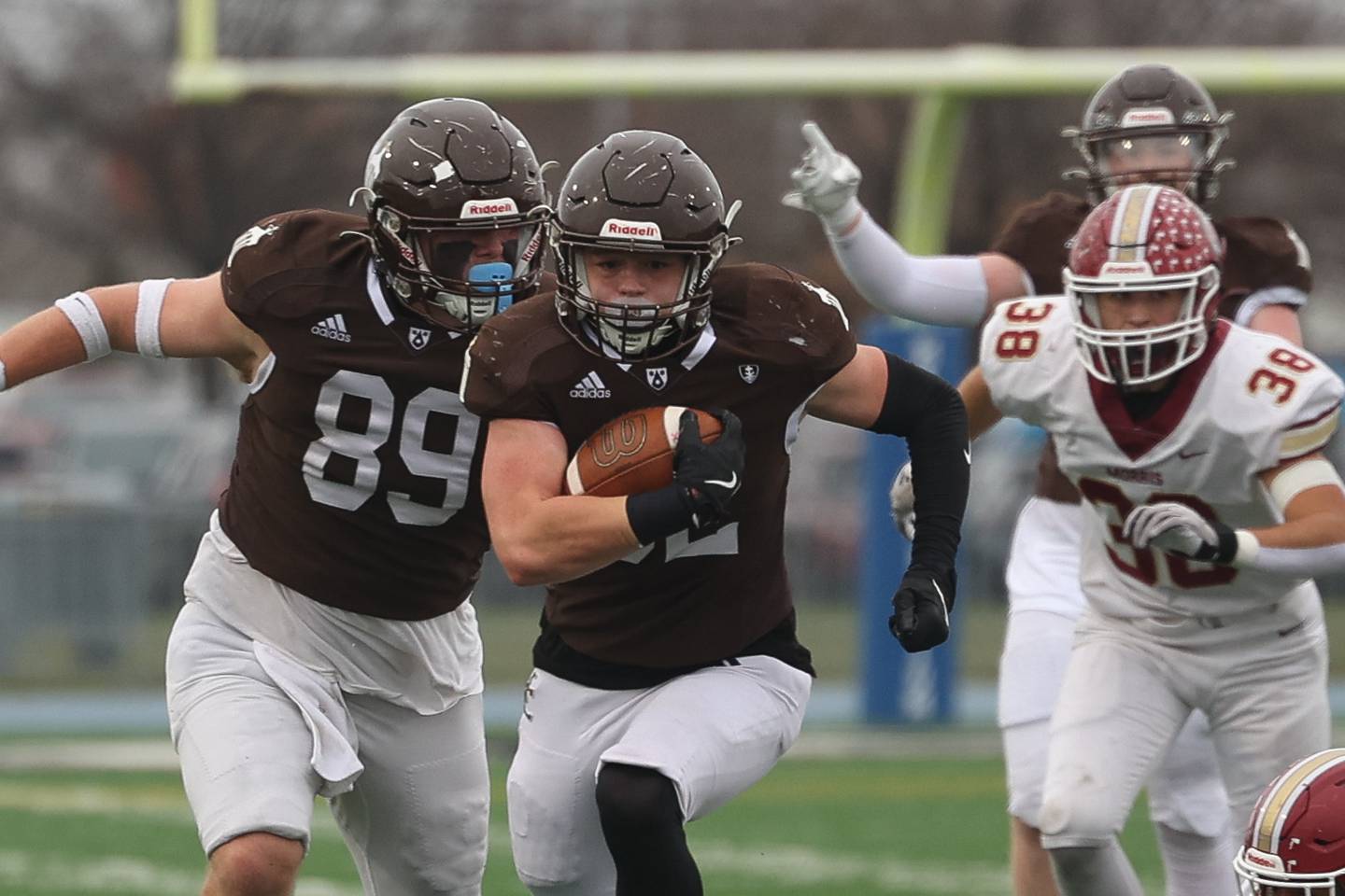 Joliet Catholic’s Vince Bremner breaks through the line against Morris in the Class 5A semifinal on Saturday, Nov. 23, 2024.