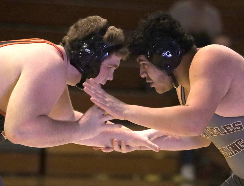 Jacobs’ Max Garcia, right, battles Crystal Lake Central’s Logan Gough at 285 pounds in varsity wrestling on Thursday, Jan. 16, 2025, at Jacobs High School in Algonquin.