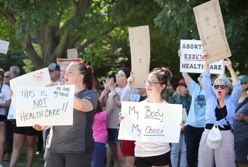 Protesters chant Friday, June 24, 2022, during a rally for abortion rights in front of the DeKalb County Courthouse in Sycamore. The group was protesting Friday's decision by the Supreme Court to overturn Roe v. Wade, ending constitutional protections for abortion.