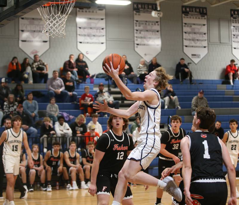Fieldcrest's Jordan Heider drives to the hoop against Fisher on Tuesday, Jan. 2, 2024 at Fieldcrest High School.