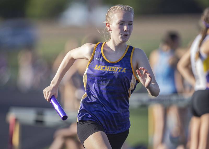 Mendota High School's Eden Pecher competes in the girls 4x800 relay at Mendota High School on May 3, 2024.