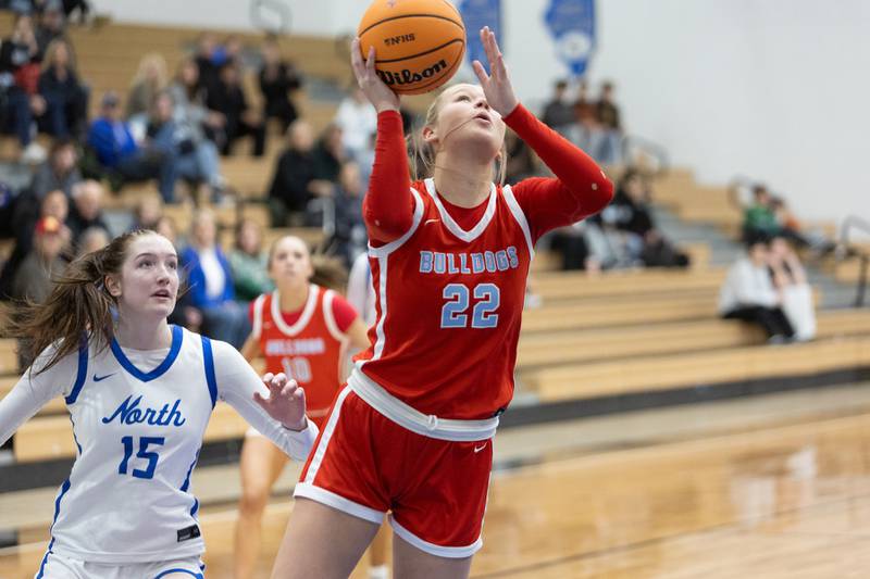 Batavia's Ali Thomas goes in for the layup against St. Charles North on Friday, Dec.12,2025 in st. Charles.