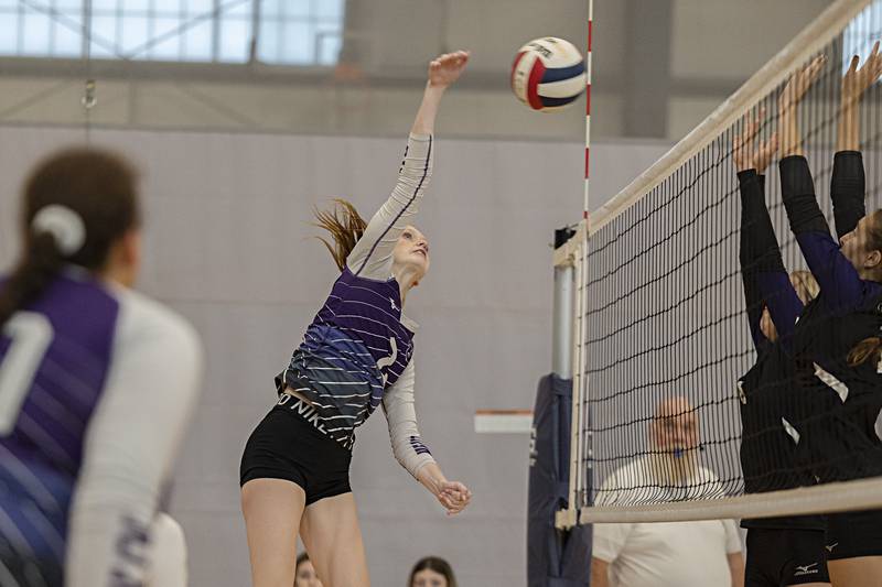 Dixon’s Madyson Tichler hammers a shot against Pecatonica at the Sterling Volleyball Invitational Saturday, Sept. 30, 2023 held at Challand Middle School.