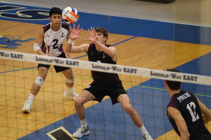 Lockport’s Matthew Krzos receives a serve against Lincoln-Way East in the Lincoln-Way East Tournament 3rd place match. Saturday, April 30, 2022, in Frankfort.