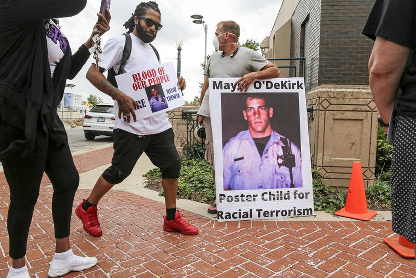 More than a dozen protestors protested Mayor Bob O'Dekirk and demanded his resignation Tuesday, Jun. 9, 2020, after a press conference addressing O'Dekirk's use of force against 23-year-old Victor Williams and 28-year-old Jamal Smith on June 1, after a mob began assaulting police near the intersection of Jefferson Street and Larkin Avenue in Joliet, Ill.