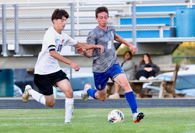 Princeton's Tyler VanDeventer battles Stillman Valley's Vinicio Arias for the ball Tuesday at Bryant Field. The Tigers won 4-0.