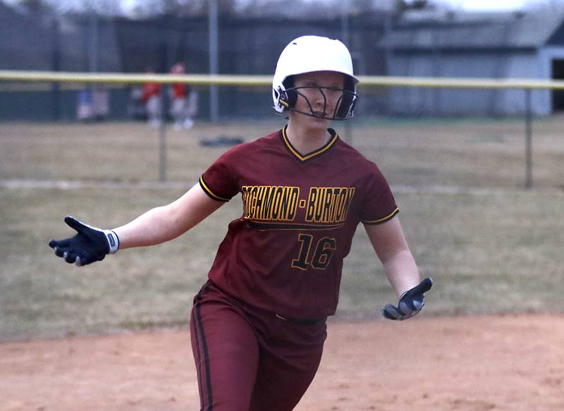 Richmond-Burton’s Taylor Davison celebrates her game winning home run during a non-conference softball game against Cary-Grove Tuesday, March 21, 2023, at Cary-Grove High School.