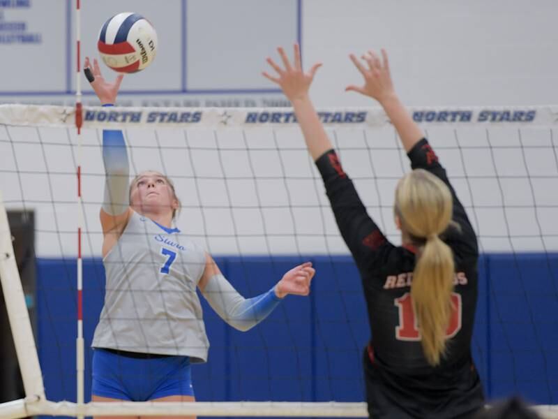 St. Charles North's Mia Mccall (7) hits the ball past Benet’s Ava Novak (10) during a game on Wednesday, September 20, 2023.