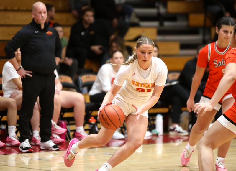 Batavia’s Kylee Gehrt drives toward the basket during a game against St. Charles East at Batavia on Thursday, Feb. 1, 2024.