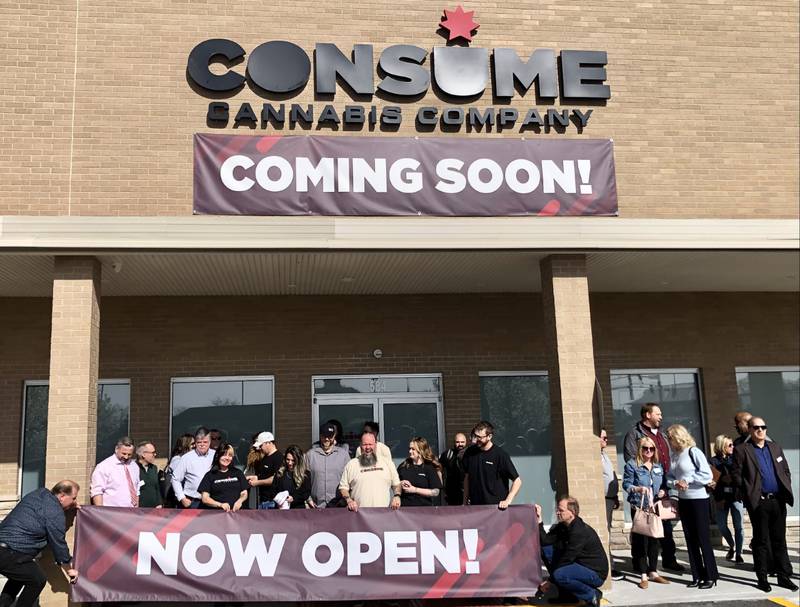 St. Charles Chamber of Commerce hosts a ribbon cutting Tuesday April 18, 2023, outside the new Consume Cannabis at 584 Randall Road in St. Charles.