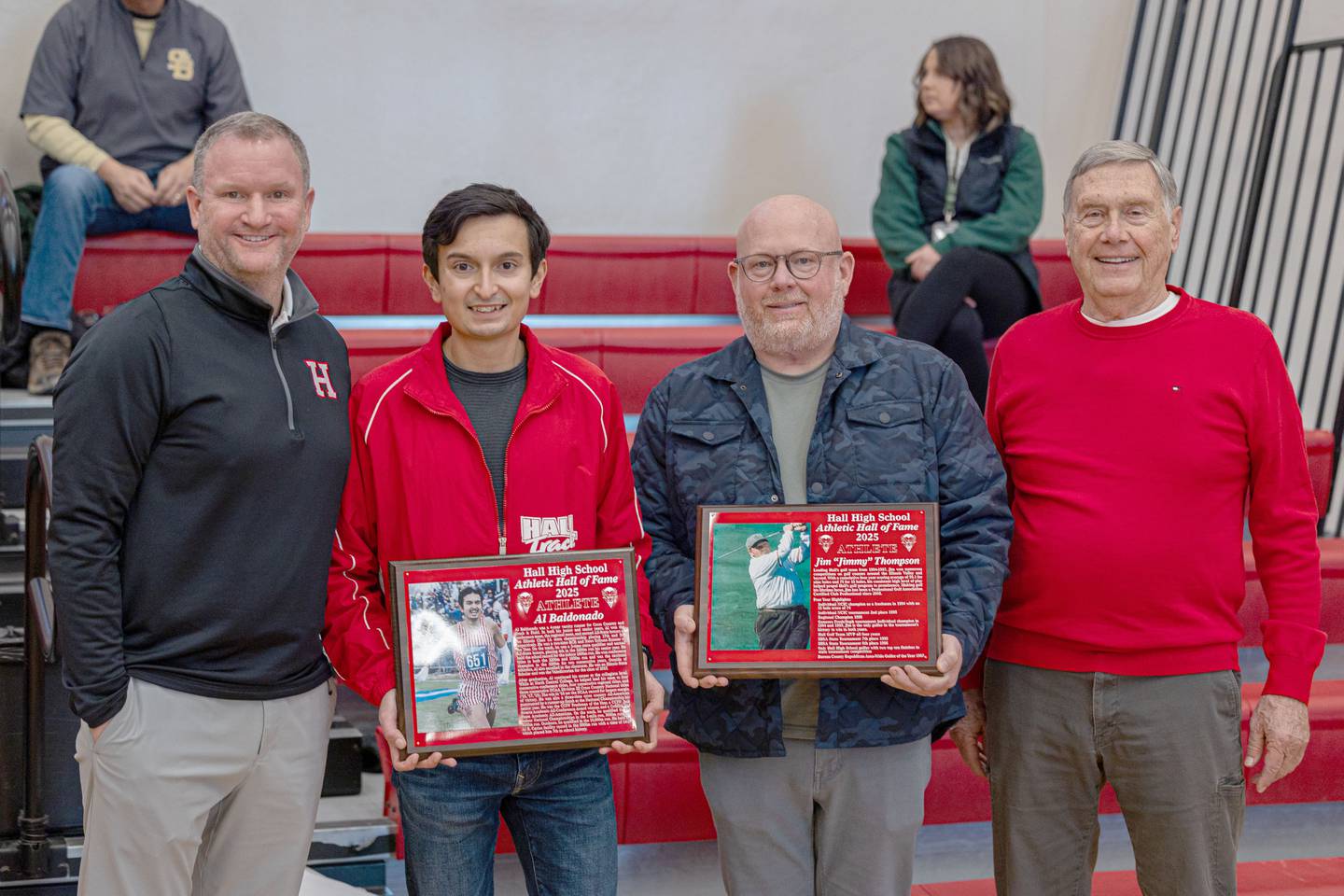 (from left) Tom Keegan, Al Baldonado, Jimmy Thompson and Gary Carruthers pose for photo at the 2026 Hall High School Hall of Fame ceremony on Saturday, January 31, 2026 at Hall High School in Spring Valley.
