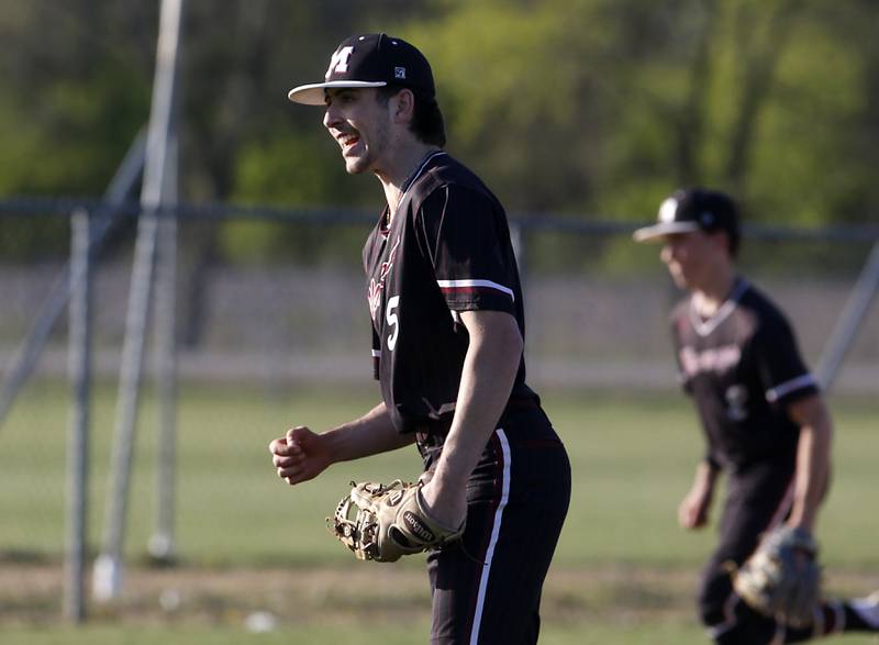 Marengo's Michael Kirchhoff celebrates a strike out to end an inning during a Kishwaukee River Conference baseball game against Richmond-Burton on Thursday, April 25, 2024, at Marengo High School.