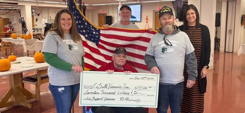 Ed Moriarity, Linda Langley, Don Bollis, Bailie Bongartz and Veterans Home resident Paul Sweet