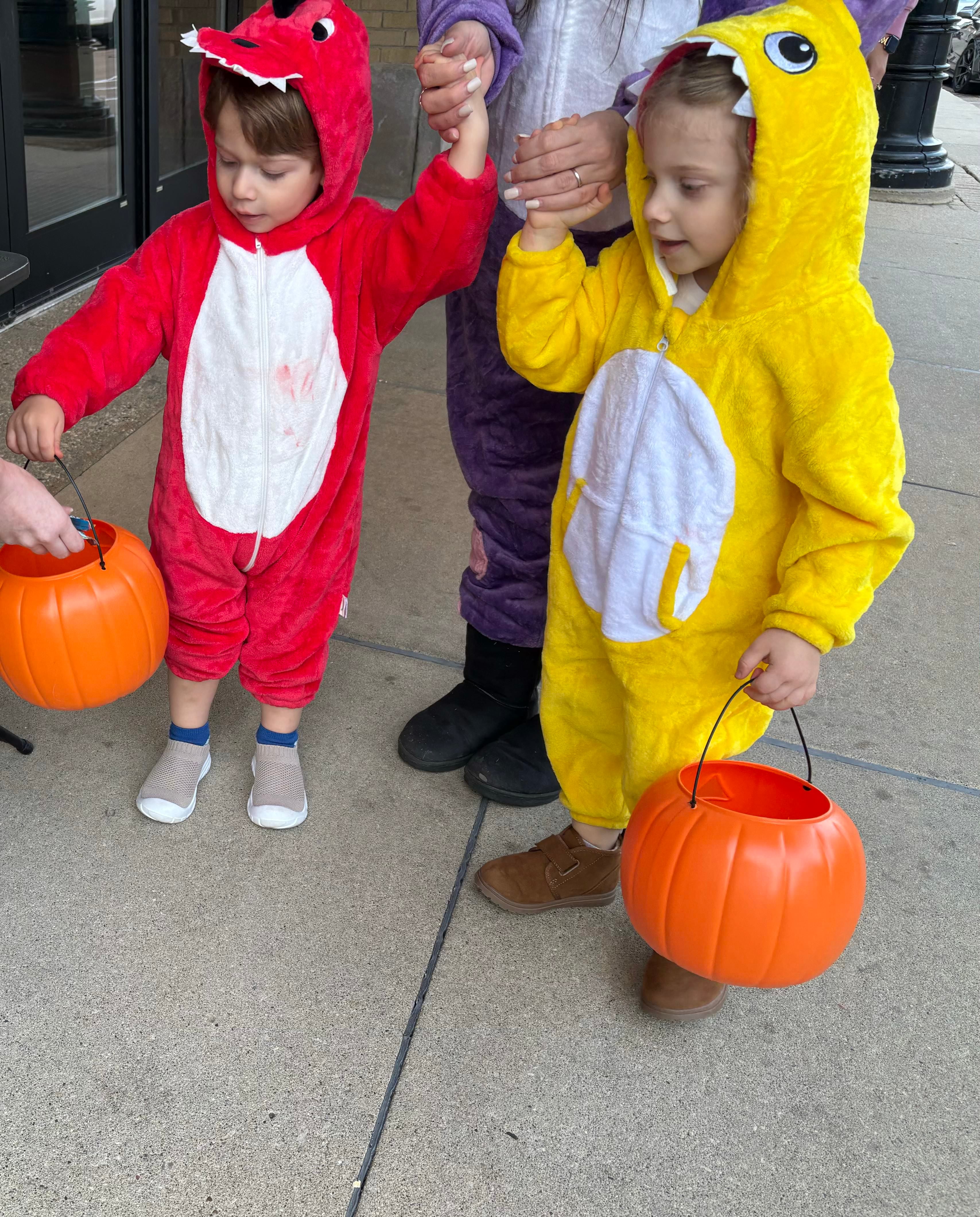 Luca McHenry, 3,  and Sofia McHenry, 2, of Geneva trick or treat during Halloween on the Square in Woodstock Oct. 31, 2025.