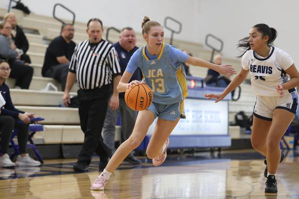 JCA girls basketball continues turnaround season, wins Peotone Holliday Classic championship over Reavis