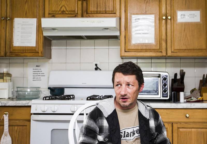 Veteran Don Andrews, 47, sits in the kitchen at New Horizons, a transitional living center for homeless veterans in Hebron on Thursday, Sept. 29, 2016. Andrews served in the Marine Corps. from 1987-1991 and has been living at New Horizons for six months.