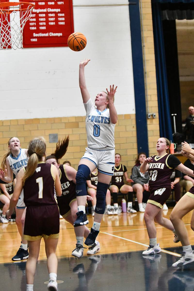 Cissna Park's Addison Lucht tosses in a shot after maneuvering through Watseka-Milford's defense on Monday, Feb. 10, 2025, during the Timberwolves' 61-40 victory.