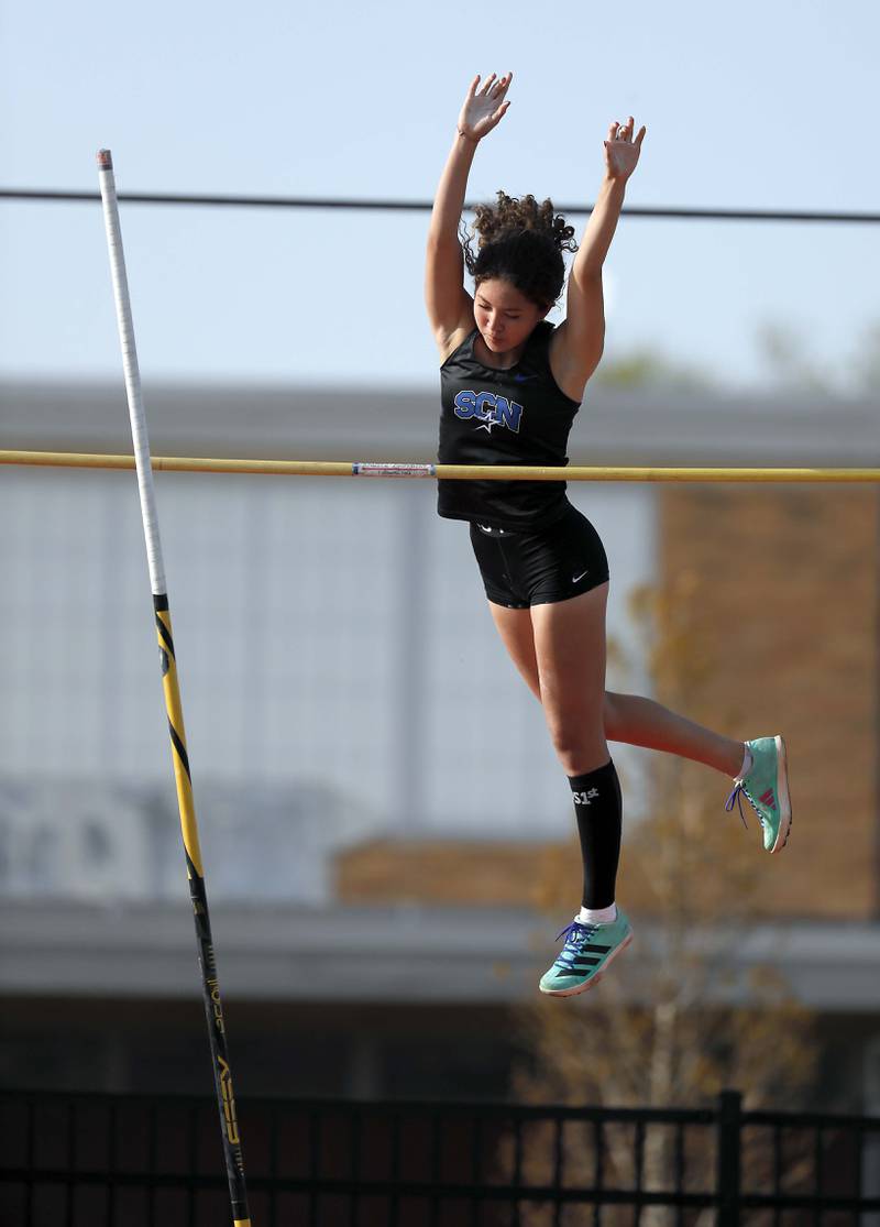 Hannah Wallace, of St. Charles North competes in the pole vault during the Kane County girls track and field meet Thursday April 27, 2023 in Aurora.