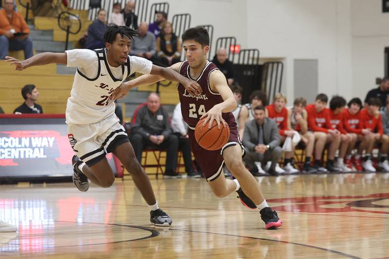 Lockport’s Majd Awad drives to the paint against Lincoln-Way Central on Tuesday, Jan. 23rd, 2024 in New Lenox.