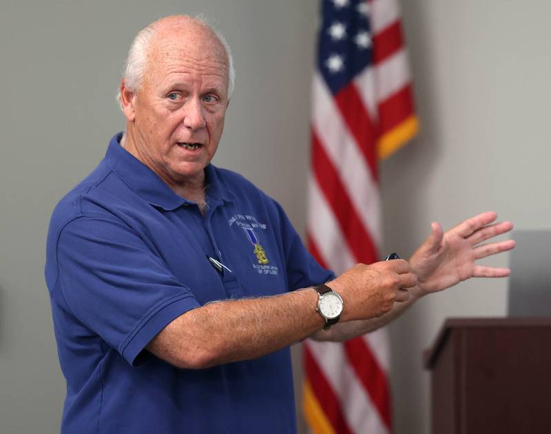 Dennis Maher, from the Sons of Union Veterans of the Civil War, talks about the DeKalb County Soldiers and Sailors Monument during his presentation “Courthouse Guards” Thursday, Sept 11, 2025, at the DeKalb County History Cener in Sycamore. The Soldiers and Sailors monument stands in front of the DeKalb County Courthouse in Sycamore.