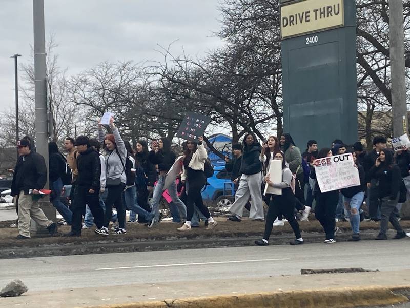 Joliet high school students march down Jefferson Street in Joliet as they take part in a student walkout to protest actions by Immigration and Customs Enforcement agents on Friday, Feb. 6, 2026.