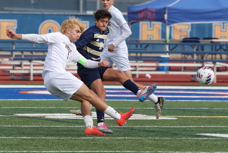 Prairie Ridge's Brandon Matei takes a shot in front of Lemont's Dylan Jaczak Saturday, Nov. 9, 2024, during their Class 2A state third place game at Hoffman Estates High School.