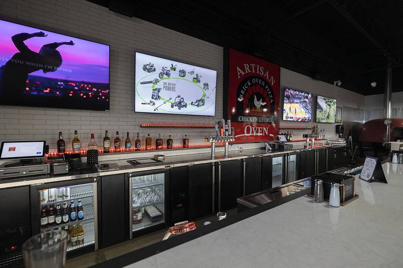 Artisan Oven in Sterling has a full bar and offers pizza, salads and classic Chicken George.