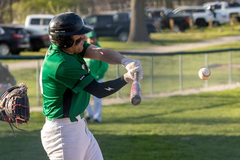 Evan Cox (10) of Dwight hits ball on Tuesday, April 15, 2025 at St. Bede Academy in Peru.