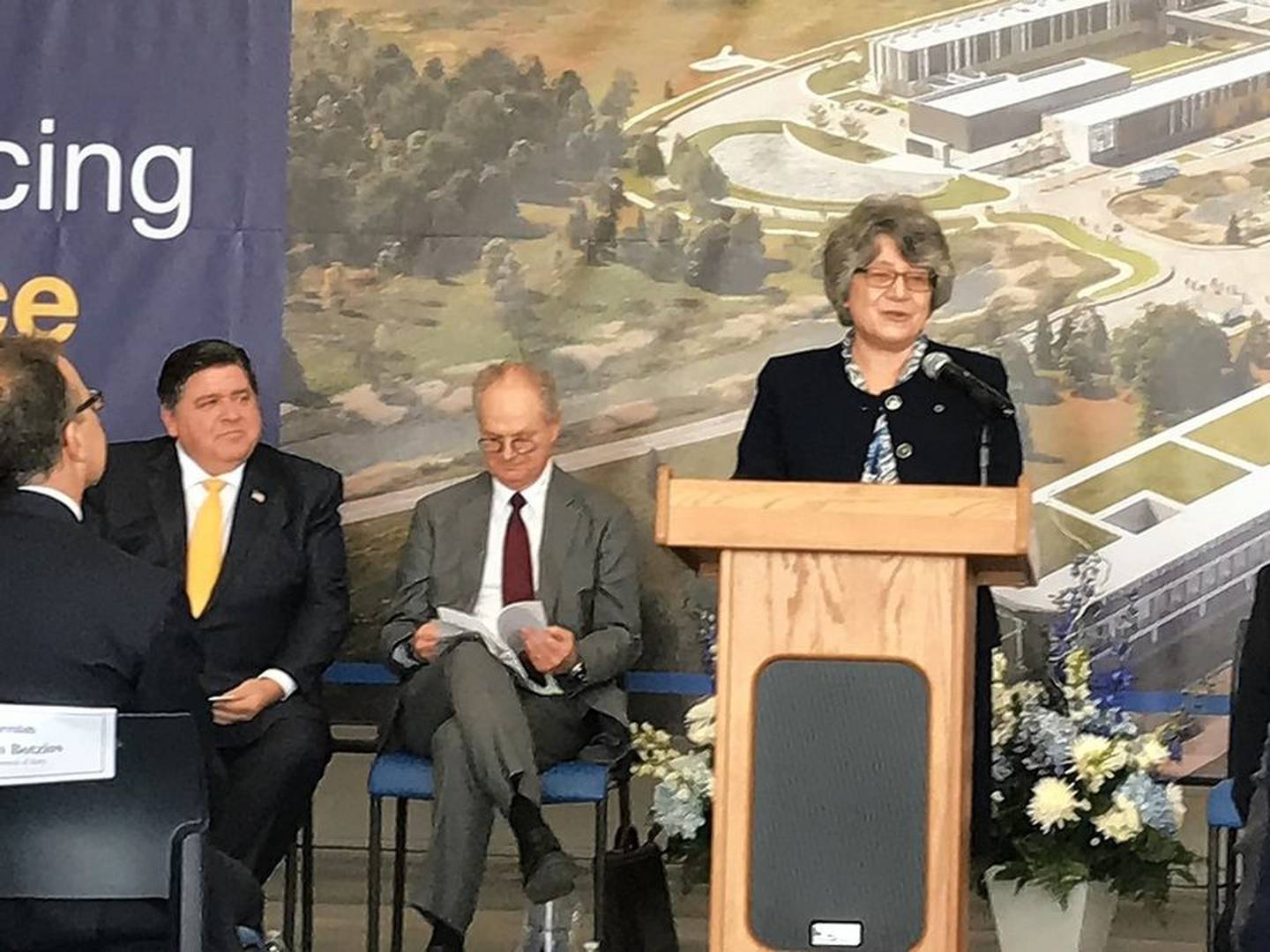 Fermi National Accelerator Laboratory Director Lea Merminga gives remarks at a ceremony celebrating the opening of two new facilities and the groundbreaking for a new accelerator.
