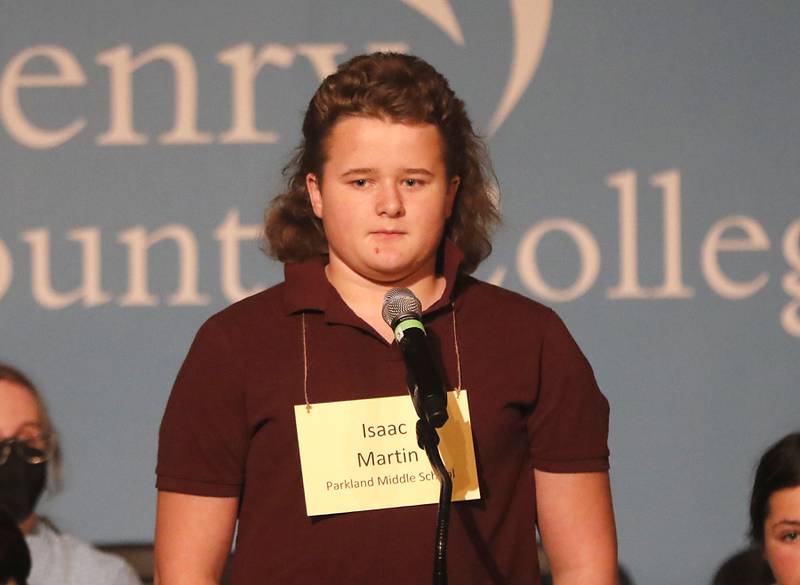 Isaac Martin of Parkland Middle  School in McHenry competes in the McHenry County Regional Office of Education's 2023 spelling bee Wednesday, March 22, 2023, at McHenry County College's Luecht Auditorium in Crystal Lake.
