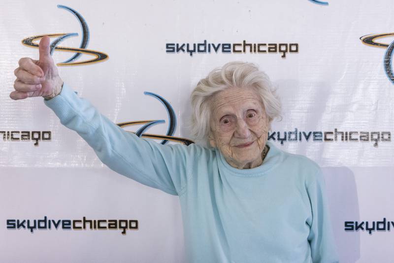 Dorothy Hoffner poses for media photos after her world record breaking skydive attempt for the oldest person in the world to skydive. The record was set at Skydive Chicago on October 1, 2023.