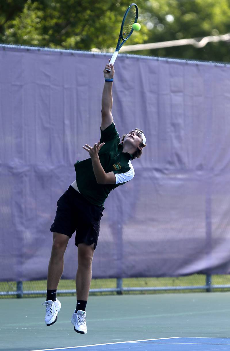 Crystal Lake South’s Eryk Bucior serves the ball as he competes in the Class 1A Boys Doubles State Tennis Tournament on Thursday, May 23, 2024, at Rolling Meadows High School in Rolling Meadows.