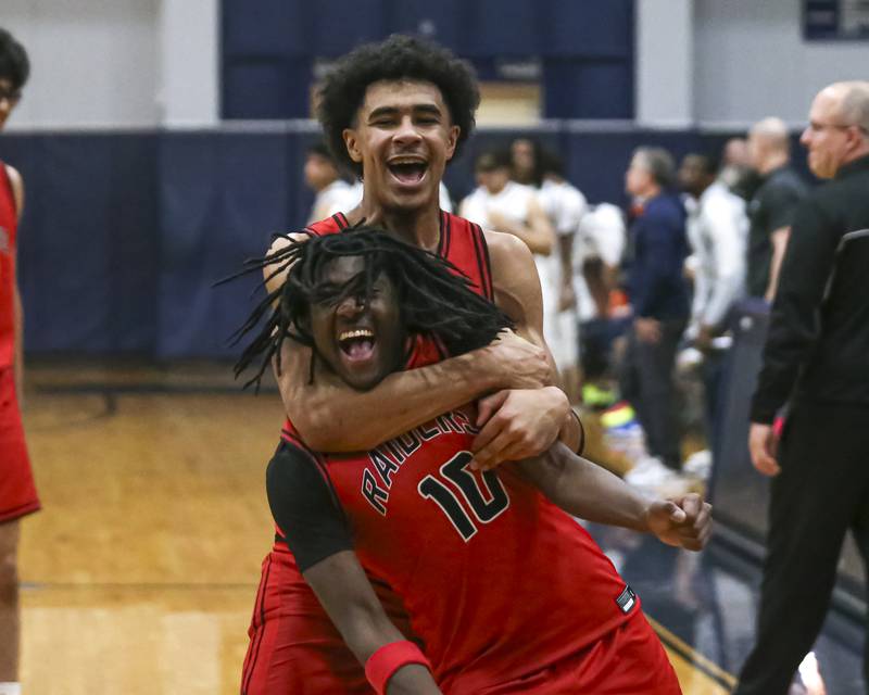 Bolingbrook celebrates the win over Oswego East in their basketball game between Bolingbrook at Oswego East Friday, Jan 30, 2026 in Oswego.