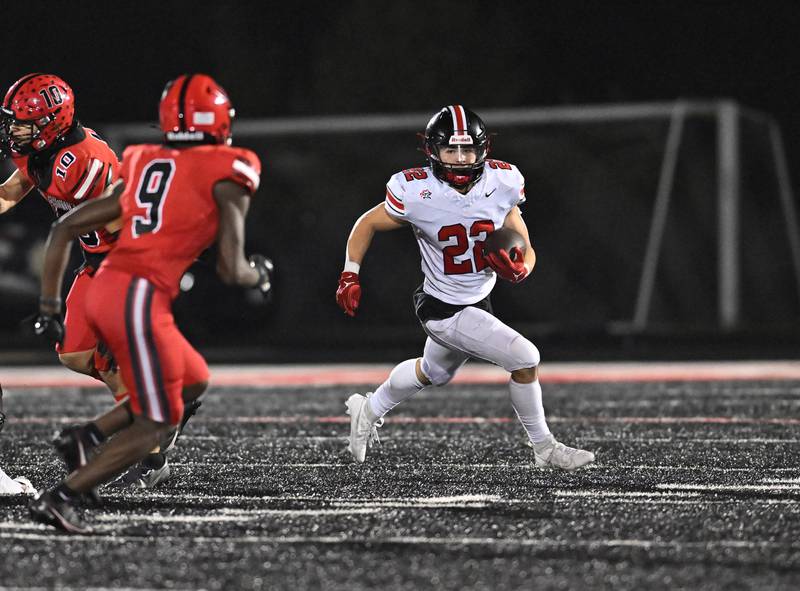 Lincoln-Way Central's Anthony Noto looks to pickup big yardage during a non-conference game against Bolingbrook on Friday, Sep. 29, 2023, at Bolingbrook. (Dean Reid for Shaw Local News Network)