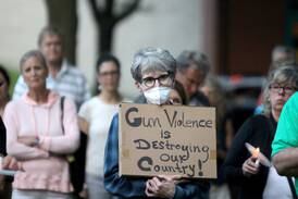More than 150 gather in Geneva to honor Highland Park victims, call for change to gun policies